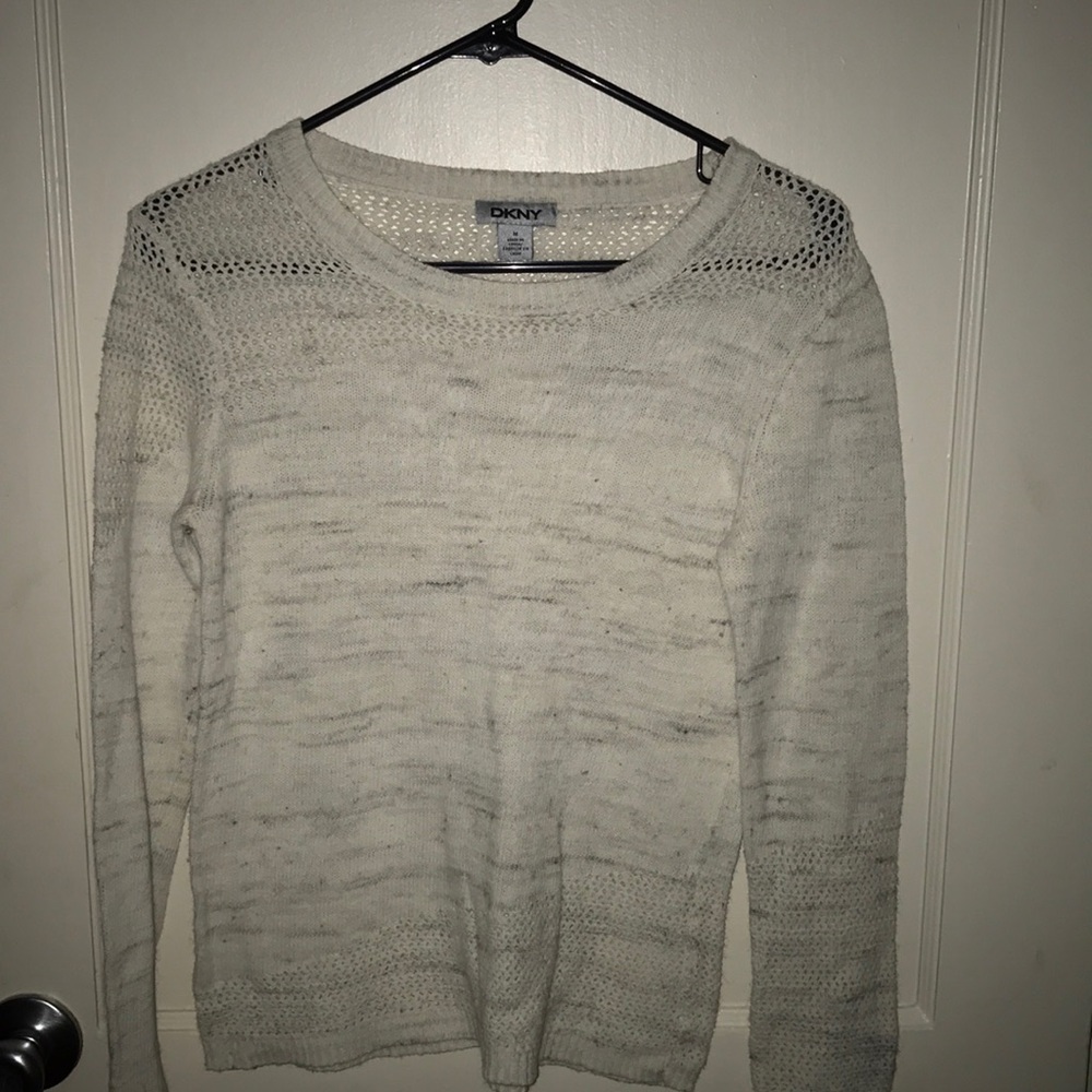 An white and gray sweater